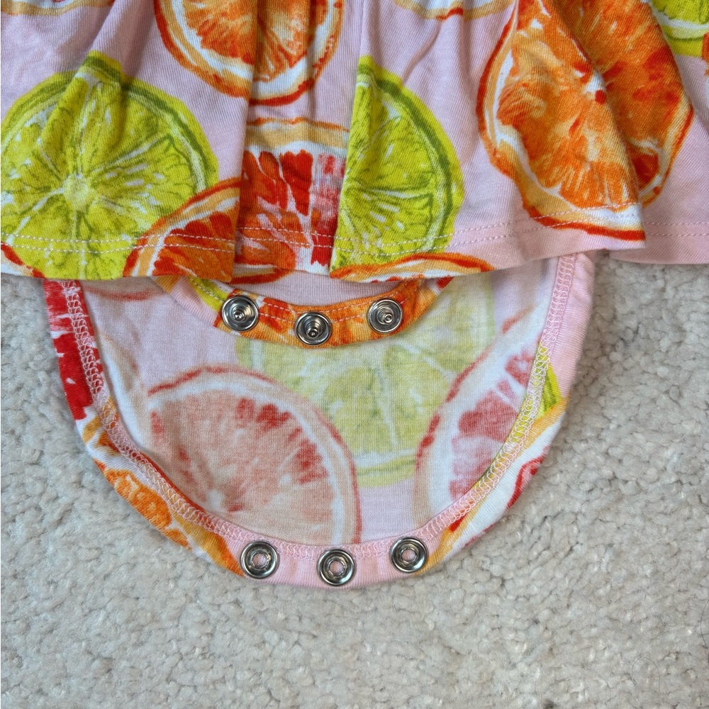 Posh Peanut Flutter Sleeve Twirl Bodysuit in a Citrus print - Picture 5 of 7